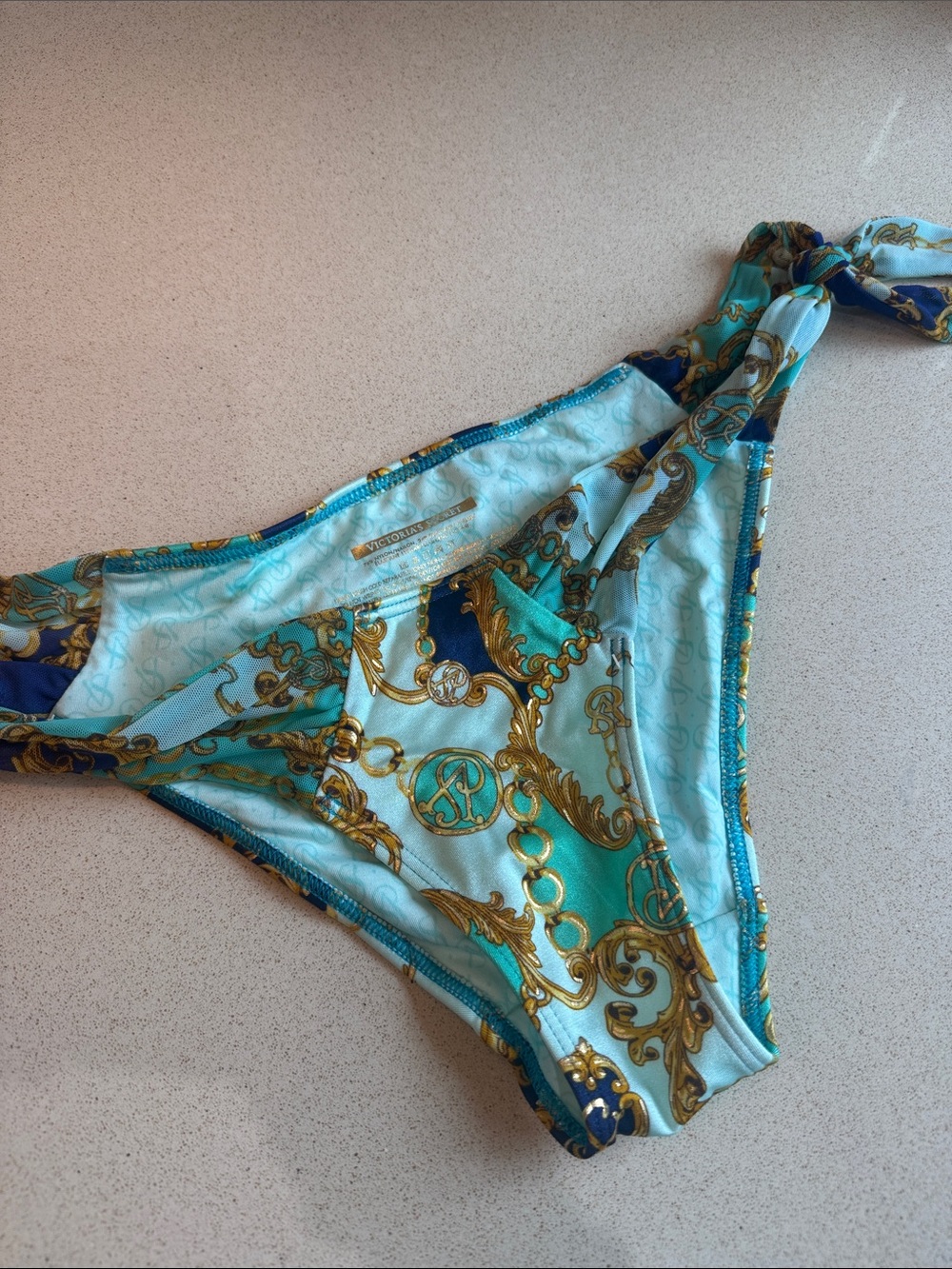 Victoria’s Secret Turquoise & Gold Print side tie bikini bottoms